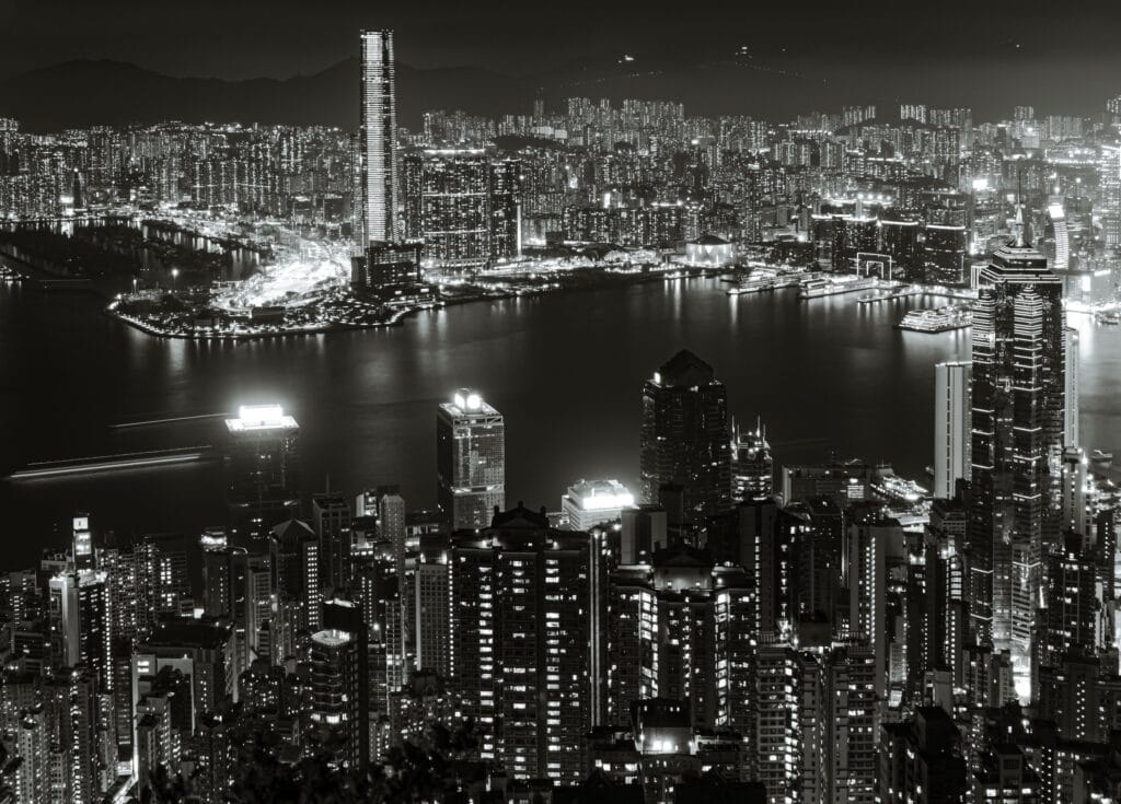 Black and white long exposure view from The Peak, Hong Kong Island over the harbour to Kowloon