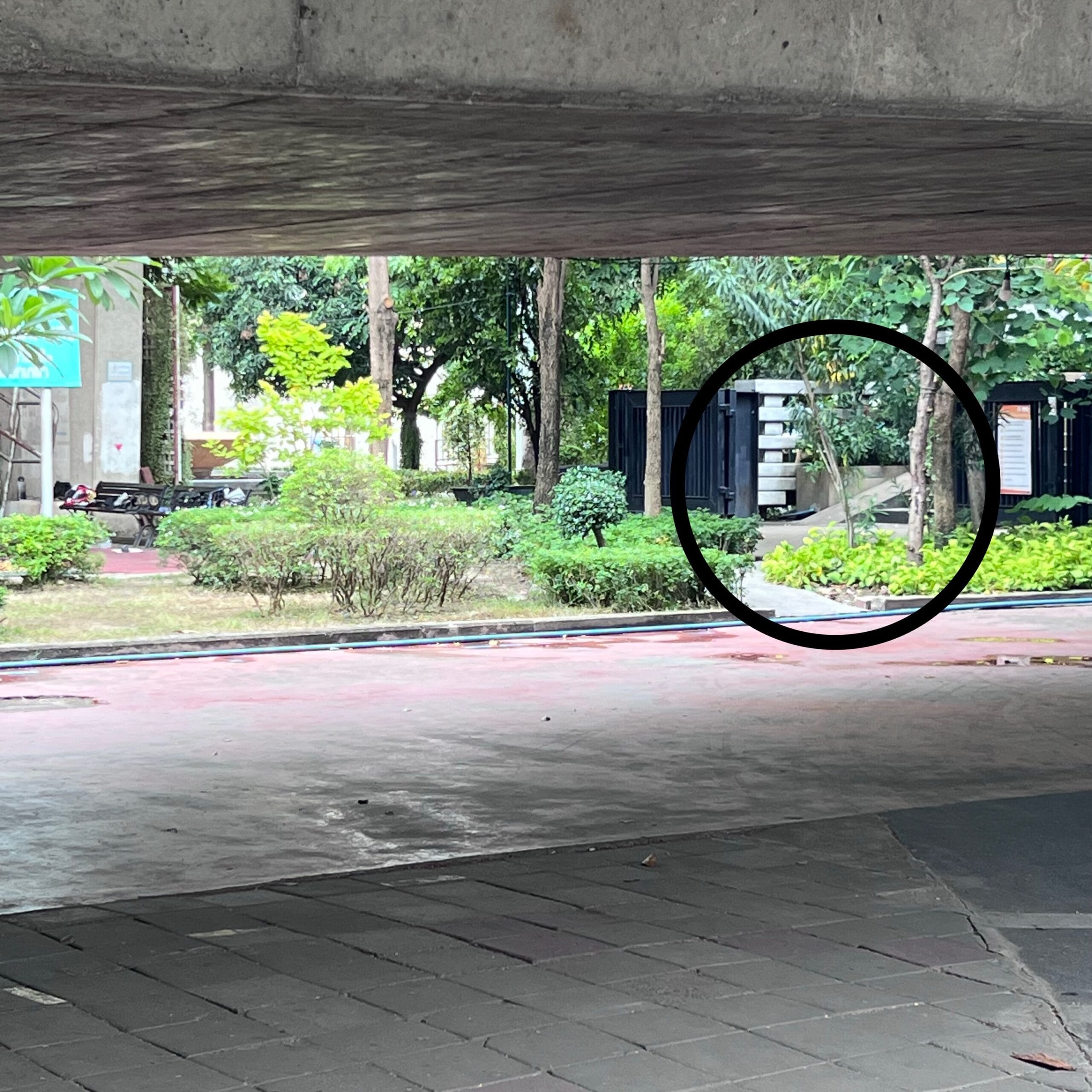 Under the road bridge to the entrance of the Chao Phraya Sky Park