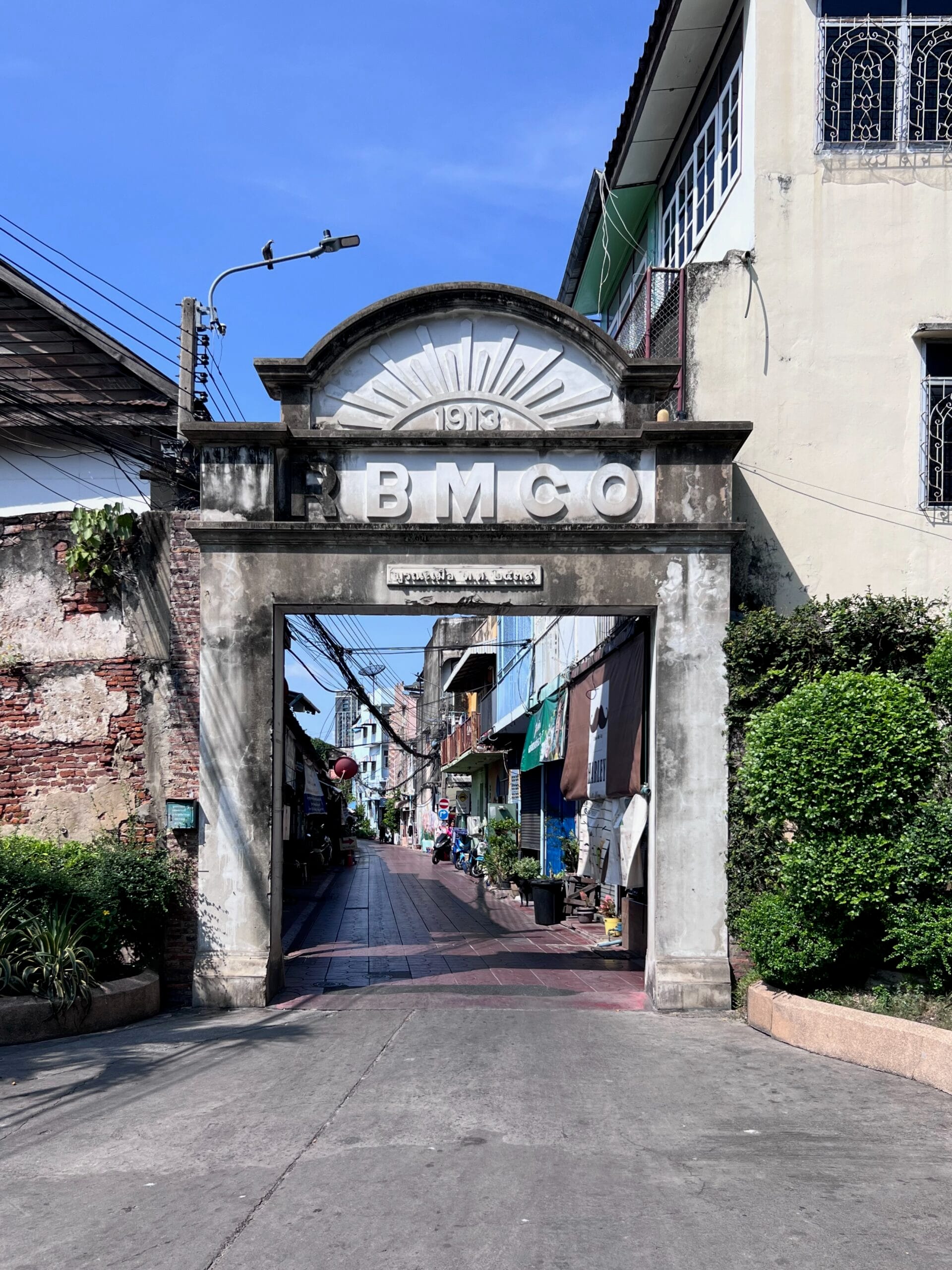 The RBMCO archway over a bangkok alley