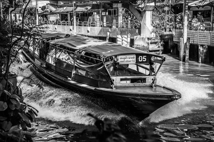The high speed Saen Saep canal taxi in early morning sunshine.