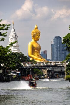 Great Buddha of Paknam seen from the canal viewpoint along the Talat Phlu Food Market Walk.