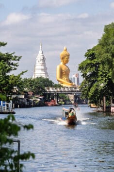Great Buddha of Paknam seen from the canal viewpoint along the Talat Phlu Food Market Walk.